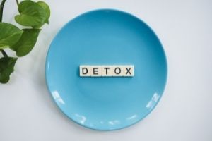 a plate with the word detox placed on it